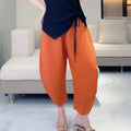 Plissé Pleated Palazzo Pants